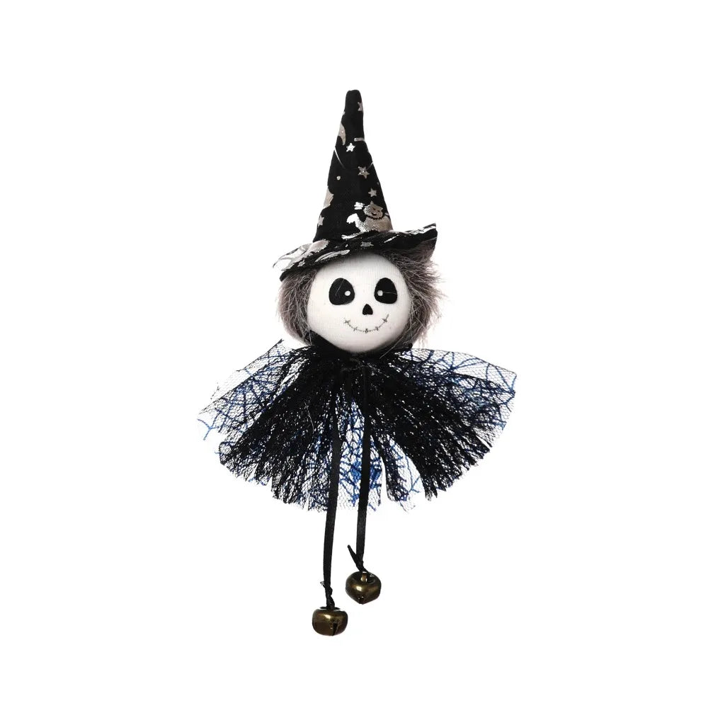 A black witch hat ornament featuring a carved pumpkin face and black netting details.