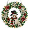 An LED-illuminated diamond painting wreath kit featuring a festive Christmas design with green foliage, red berries, and whit