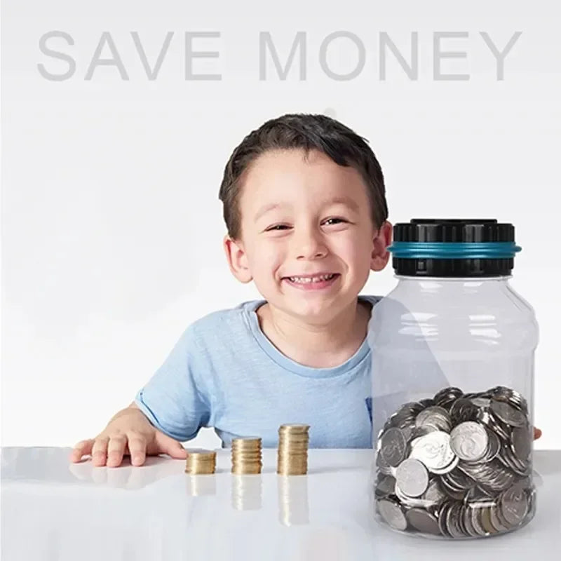 A smiling boy is shown next to a clear glass jar filled with silver coins on a white surface.