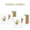 A set of Golden+Golden handprint and footprint ink pads on white cards.