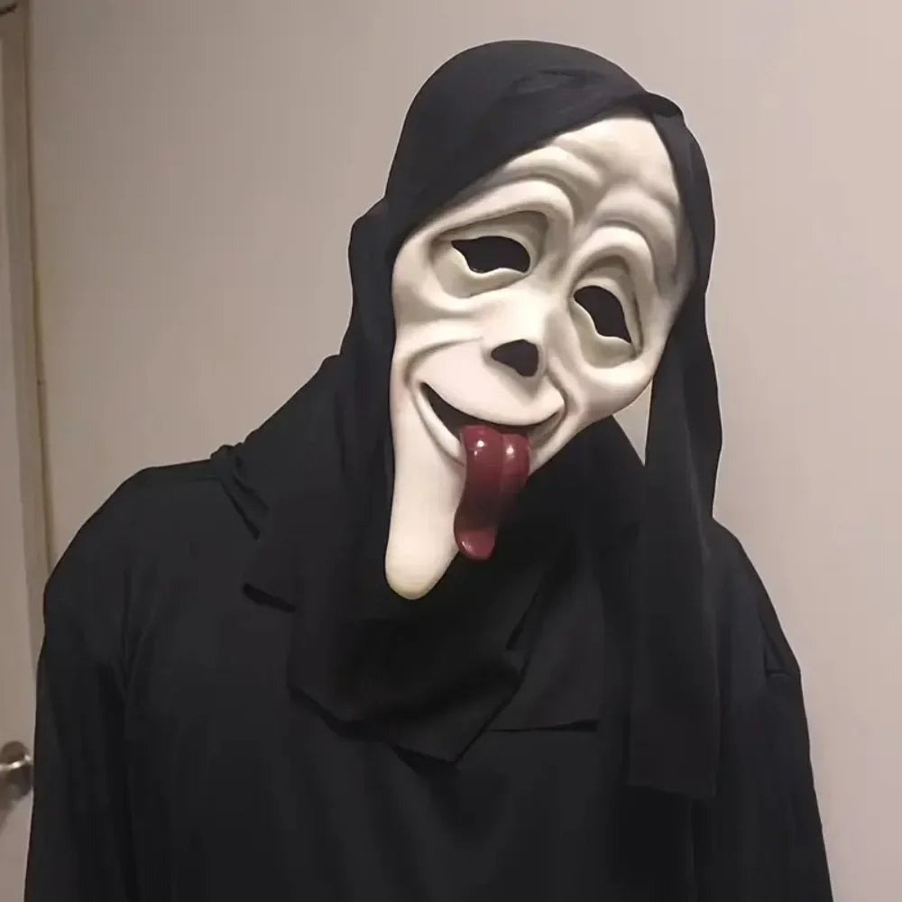 A white horror mask with a black hood and a tongue sticking out, used for Halloween or cosplay.