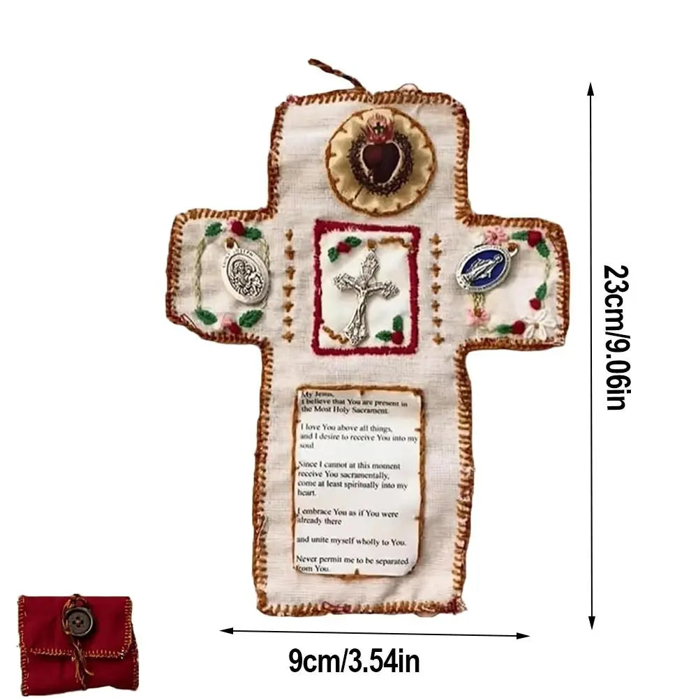 Handmade prayer quilt featuring a cross design with silver cross pocket shrine and floral embroidery