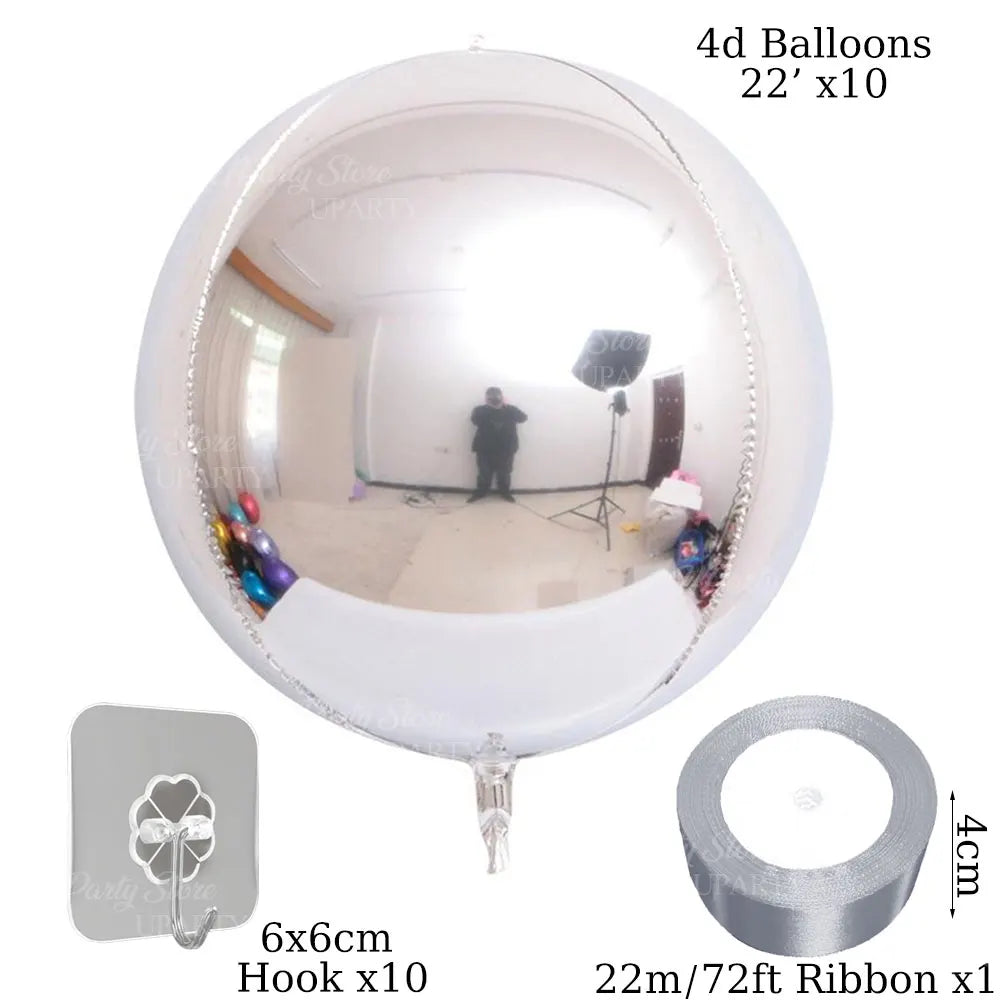 A white round balloon filled with 4D foil balloons and a ribbon, along with a hook and ribbon roll.
