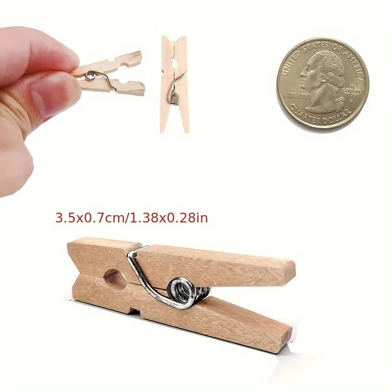 A wooden mini clothespin is shown next to a US quarter coin and a hand, demonstrating the size of the craft supplies.