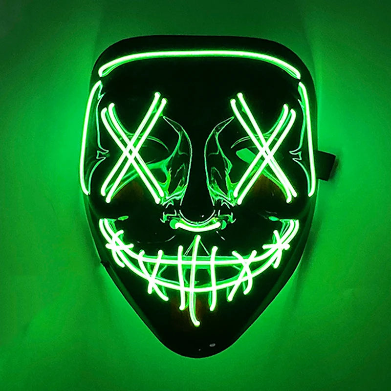 A glowing green LED mask shaped like a skull with white cross markings, displayed against a dark background.