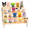 A wooden display shelf holds various colorful animal micro building block figures in different poses and colors.