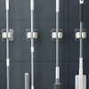 Wall mounted storage rack for hanging mop and broom as a whole