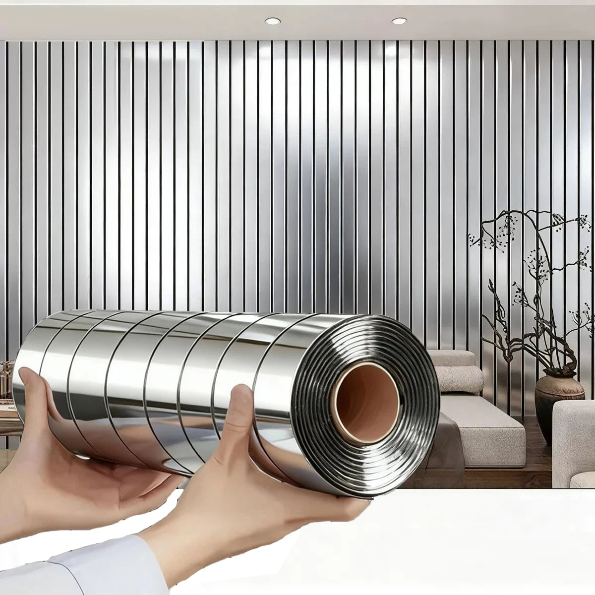 Hands hold a cylindrical metal object with a mirror effect finish against a vertical ribbed wall.