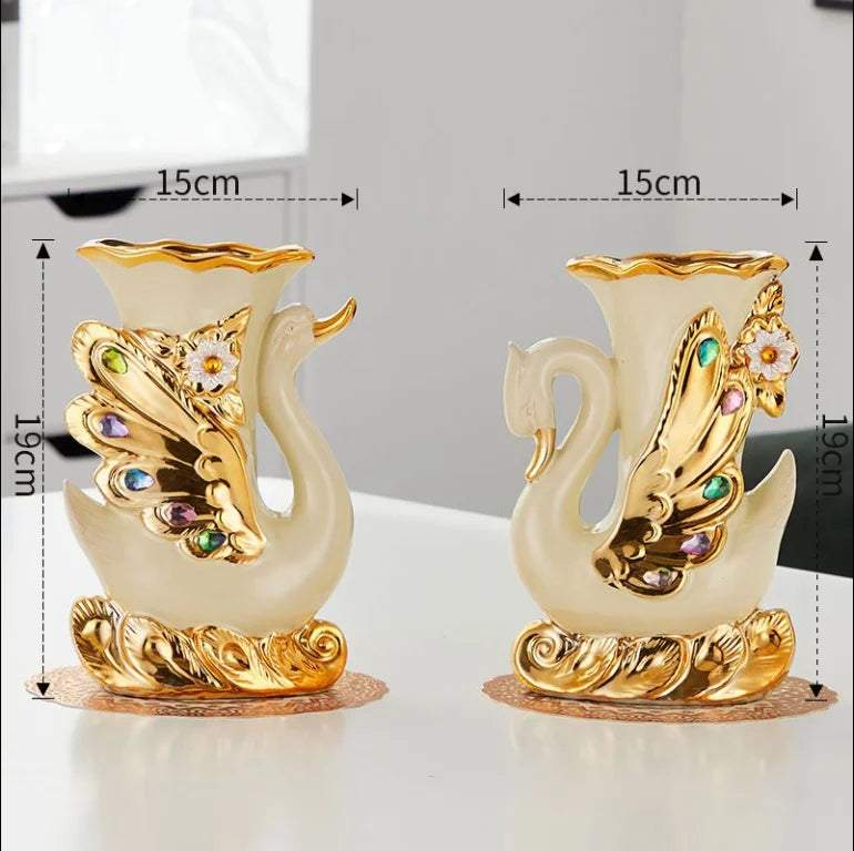 Gold ceramic swan vase for tabletop decor featuring gold and iridescent accents