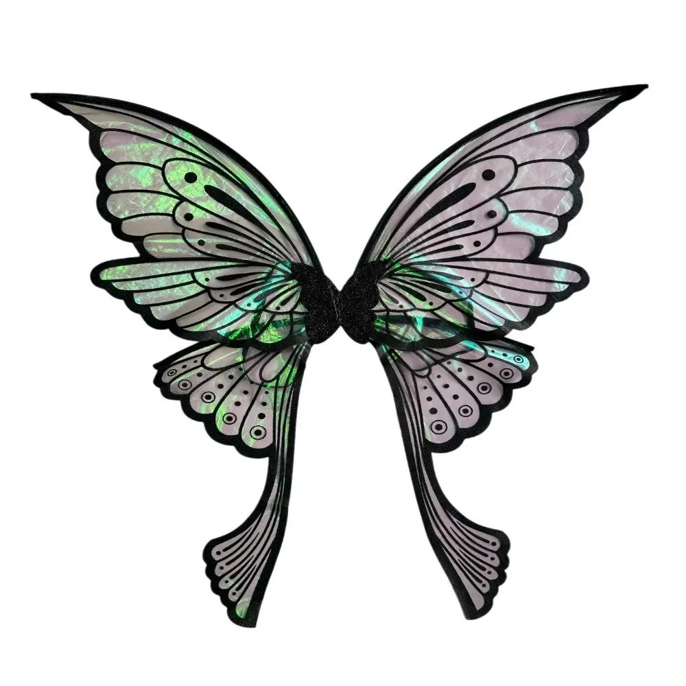 A pair of iridescent, sparkling fairy wings with intricate patterns and a wand are displayed against a white background.
