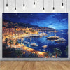 A night cityscape featuring illuminated high-rise buildings and boats on a dark blue water under a starry sky.