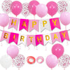 A set of pink and gold birthday decorations including balloons and a banner
