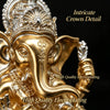 Golden Ganesha statue featuring intricate crown detail and high quality electroplating.