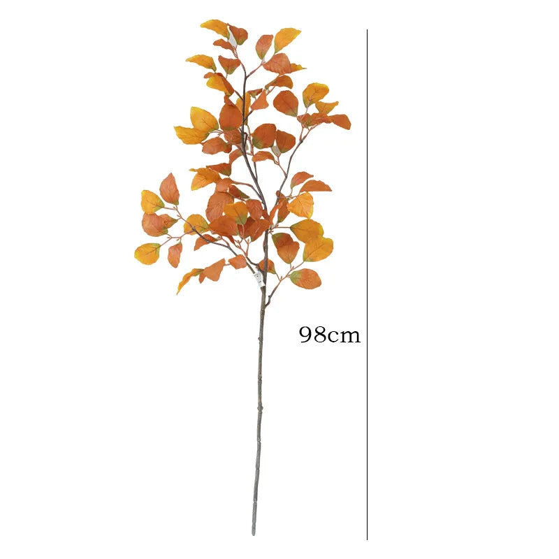 A branch of autumn beech leaves in shades of orange and brown, displayed vertically.