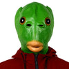 A green realistic horror animal mask with large eyes and an orange mouth worn by a person.