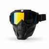 Black full face skull riding goggles with a yellow-orange mirrored lens and a black strap.