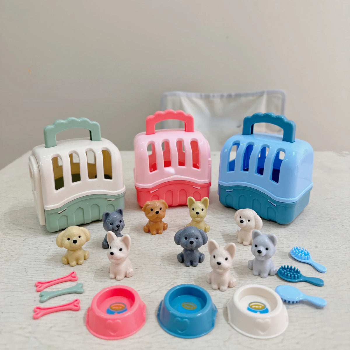 An assortment of eight pink and blue dog basket toys for children