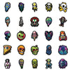 A collection of various skull and joker themed decals and stickers in different colors and styles.