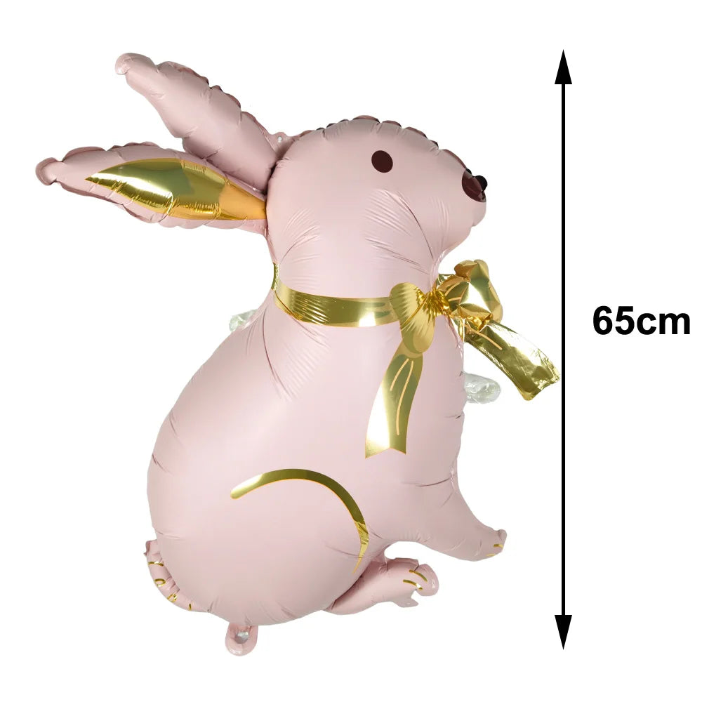 Pink foil balloon shaped like a bunny with gold accents, measuring 65cm tall.