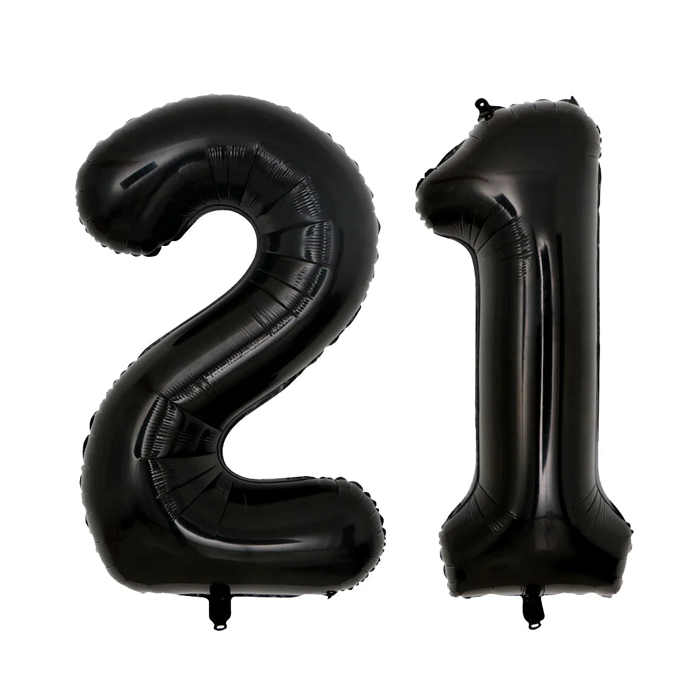 A set of two giant black foil balloons shaped like the number 21