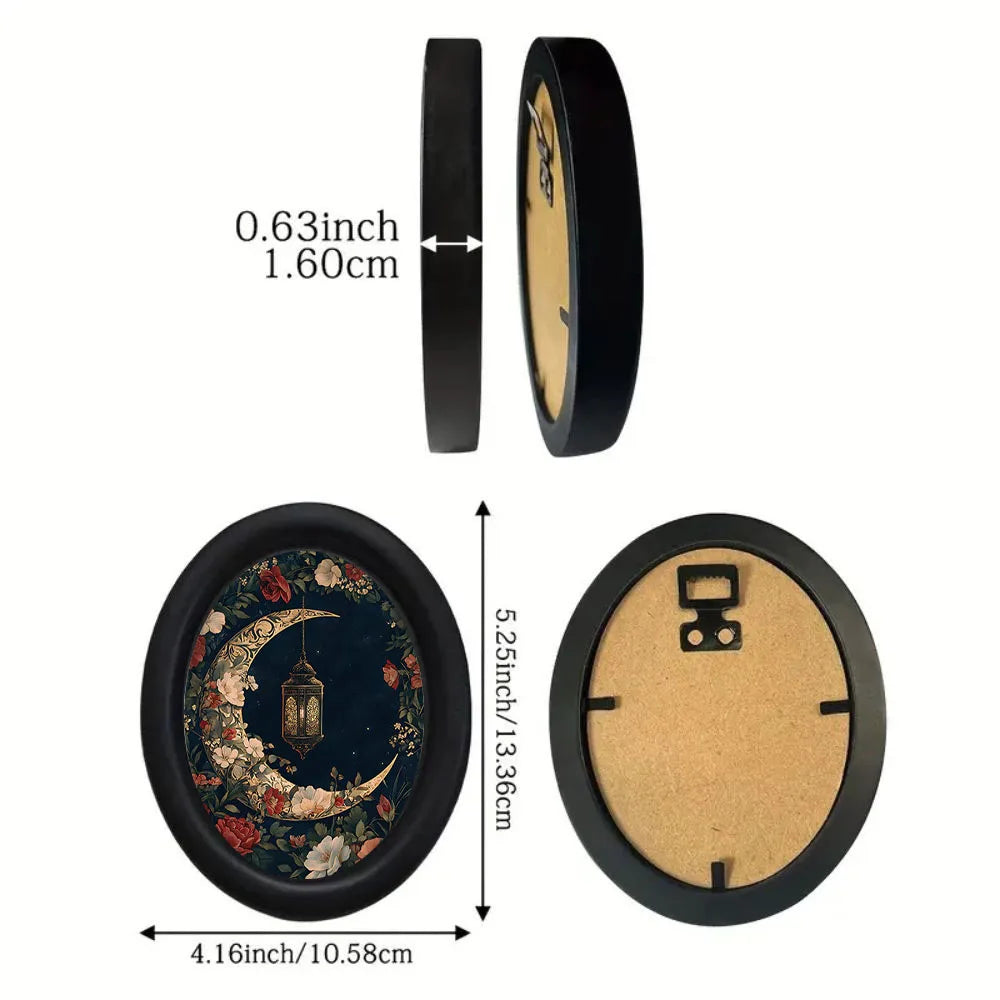 Black wall art featuring a gothic Victorian design of a flower and moon.