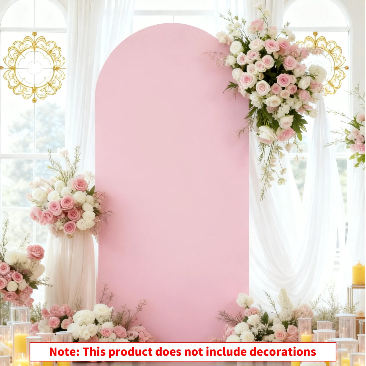A pink arched backdrop with sheer white drapery and floral arrangements, suitable for a wedding photo display.