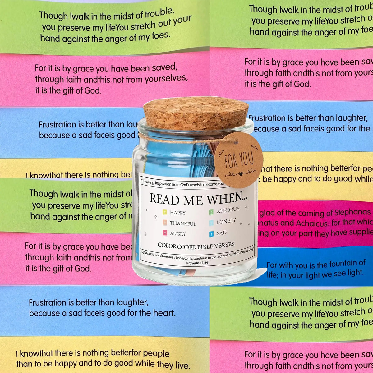 A glass jar filled with colorful Bible verses for faith and comfort