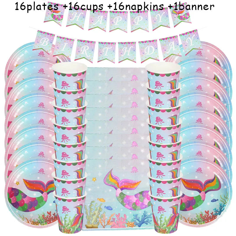 A set of pink and blue mermaid themed party tableware including plates, cups, napkins, and a banner.