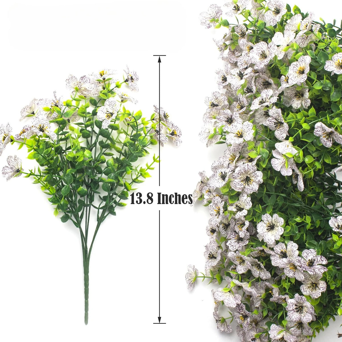 Ein Zweig künstlicher Frühlings-Nelkenblumen mit grünen Blättern vor weißem Hintergrund.