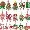 A collection of sixteen mini wooden candy cane Christmas ornaments in various festive colors and designs.