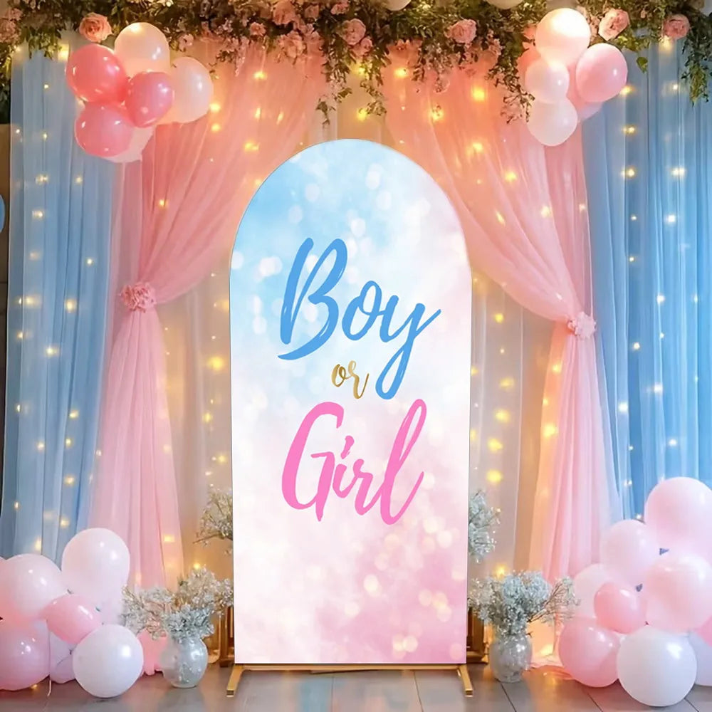 A pink and blue draped arch backdrop for a baby shower or gender reveal party featuring balloons and floral accents.