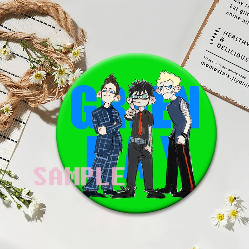 A set of collectible button pins featuring three stylized characters from a punk band album cover on a bright green backgroun