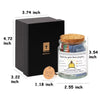 A black box and a glass jar filled with color-coded Bible verses for emotional guidance.