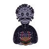 A black enamel pin badge shaped like a stylized, grotesque face with a burger design on the chest.