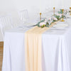 Two panels of sheer chiffon fabric used for wedding arch draping