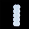 A clear silicone mold kit for making heart-shaped candles, shown against a black background.