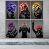 A grid of four canvas prints featuring motorcycle helmets with neon glow effects on a gray wall.