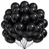 A bunch of black round latex balloons tied together for a celebration