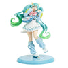 A PVC collectible figurine of Hatsune Miku in a light blue outfit with green hair and a white base.