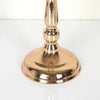 A golden silver wedding flower vase with a decorative base and slender neck.