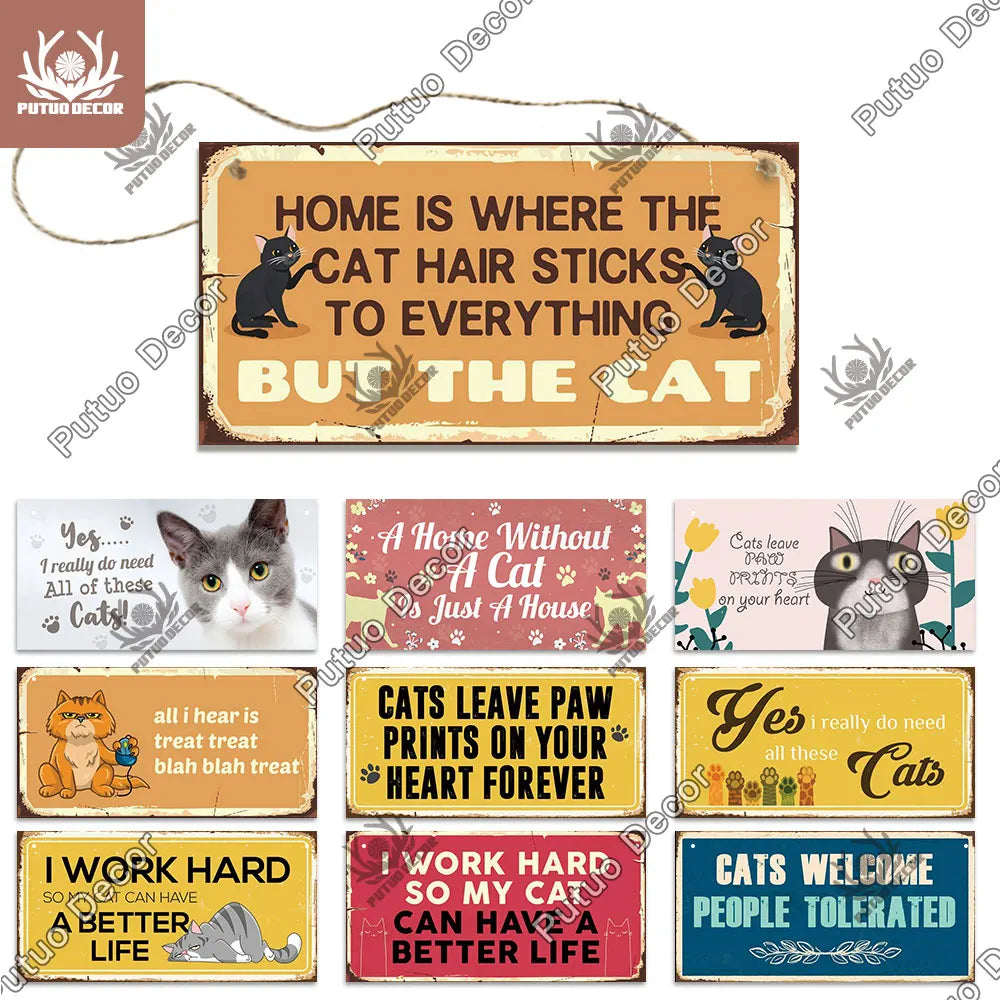 A collection of wooden wall plaques with humorous cat-themed sayings and illustrations.