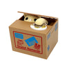A cardboard box containing an ocelot remover tool and a panda figure for saving money