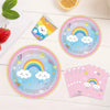 A set of colorful disposable paper plates featuring rainbows and clouds, along with a cup and napkins.