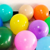 A collection of colorful matte latex balloons in shades of blue, green, yellow, orange, pink, and purple.