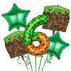 A set of green and gold balloons shaped like a number six and a star for a miner theme party decoration.