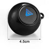 A black magic 8 ball keychain with a triangular window displaying the word NO