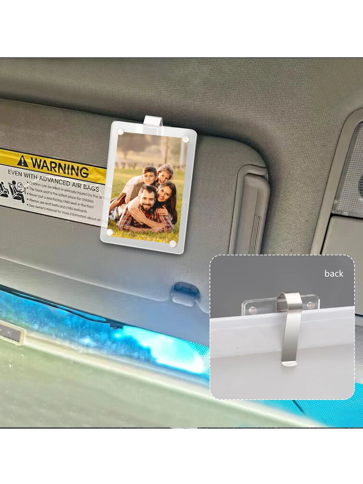 Clear acrylic photo clip with a warning sign featuring a family portrait mounted on a car sun visor.