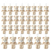 A set of mini plush teddy bear keychains in a light beige color.