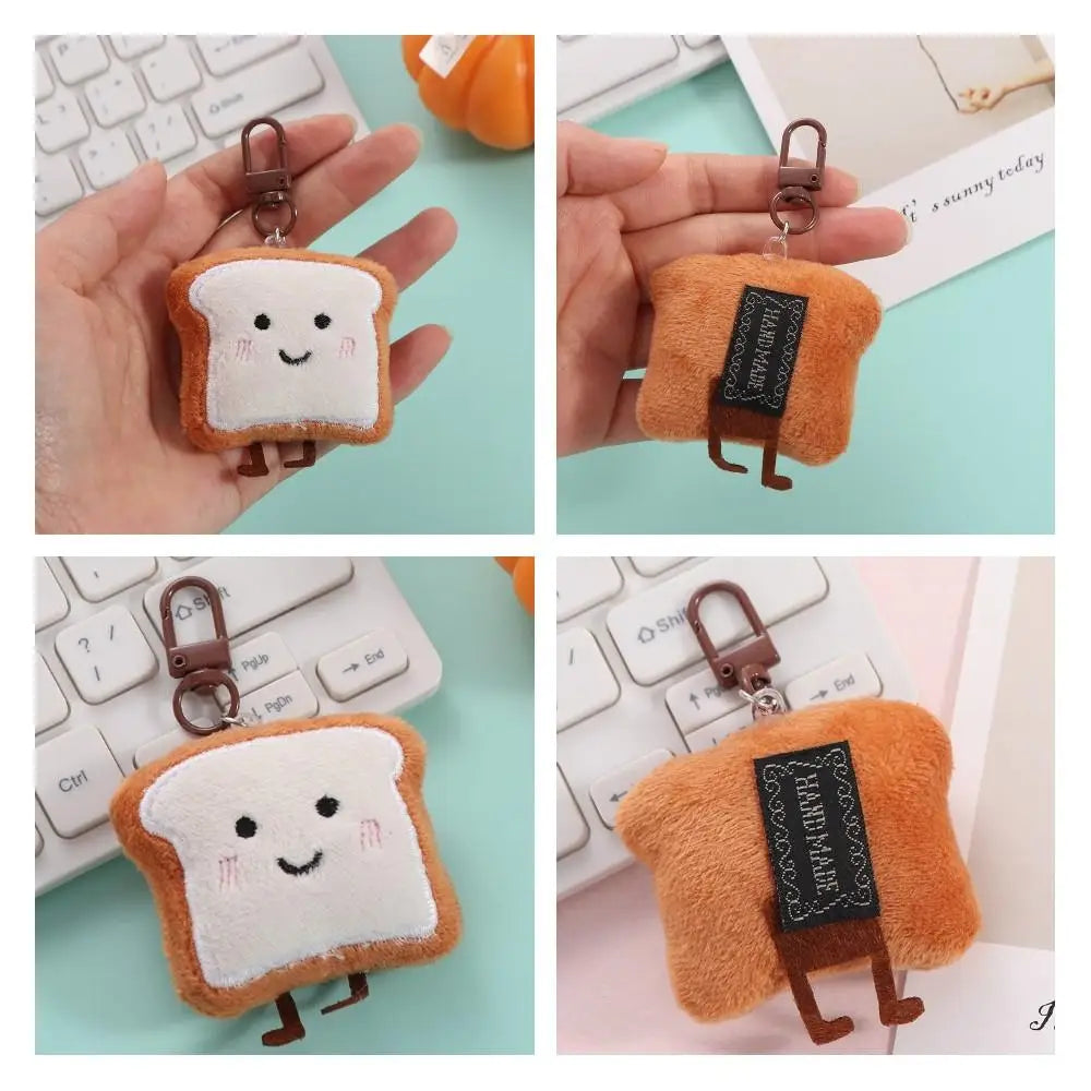 An adorable toast bread plush keychain charm in orange and white fabric with a black detail.