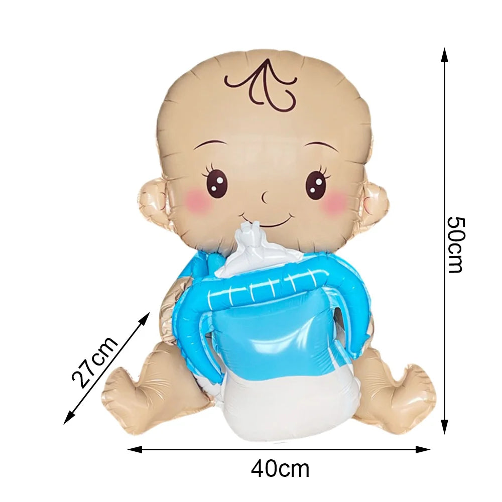 A light brown baby balloon shaped like a baby with a blue bottle attached for baby shower decor